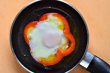 Image showing Fried egg with red pepper