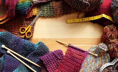 Image showing Border of colourful knitting and craft accessories