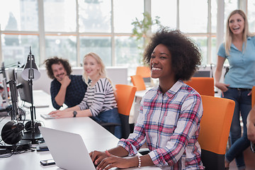 Image showing African American informal business woman working in the office