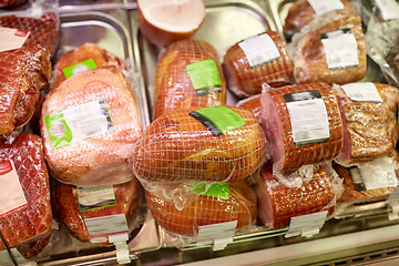 Image showing ham at grocery store stall