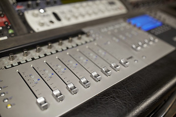 Image showing music mixing console at sound recording studio