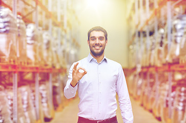 Image showing happy man at warehouse showing ok gesture