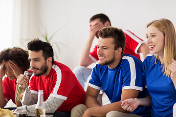 Image showing friends or football fans watching soccer at home