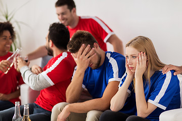 Image showing friends or football fans watching soccer at home