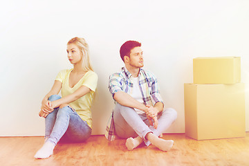 Image showing unhappy couple having argument at home