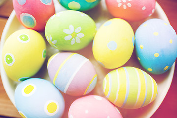 Image showing close up of colored easter eggs on plate