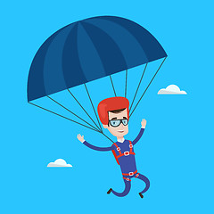 Image showing Young happy man flying with parachute.