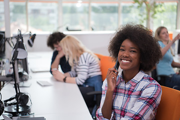 Image showing African American informal business woman working in the office