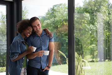 Image showing romantic happy young couple relax at modern home indoors