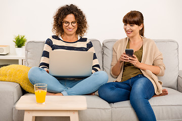 Image showing Best friends working at home