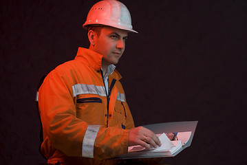 Image showing Chief miner checking the progress