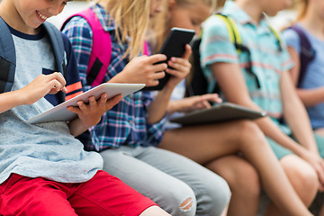 Image showing close up of elementary students with tablet pc