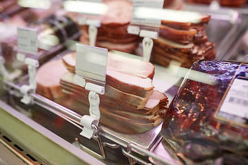 Image showing ham at grocery store stall