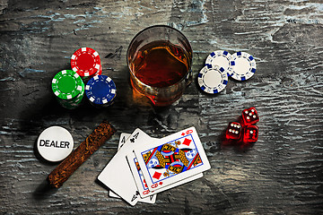 Image showing Cigar, chips for gamblings, drink and playing cards