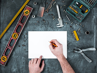 Image showing The set of construction tools on wooden table