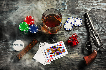 Image showing Cigar, chips for gamblings, drink and playing cards