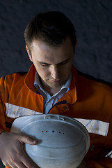 Image showing worker preparing himself