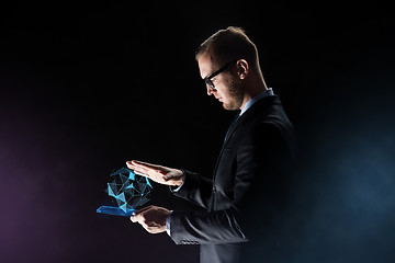 Image showing businessman with tablet pc and virtual projection
