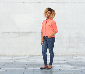 Image showing happy african american young woman over white