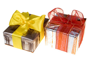 Image showing Presents with red ribbon isolated on white background