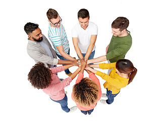 Image showing international group of happy people holding hands