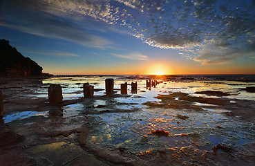 Image showing Sunrise, Reflections and silhouettes Coledale rockshelf