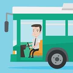 Image showing Caucasian bus driver sitting at steering wheel.