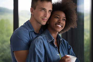 Image showing romantic happy young couple relax at modern home indoors