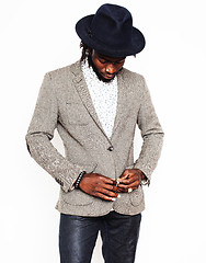 Image showing young handsome afro american boy in stylish hipster hat gesturin