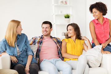 Image showing group of happy friends talking at home