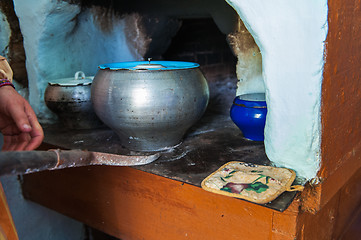 Image showing cooking meals in a Russian stove