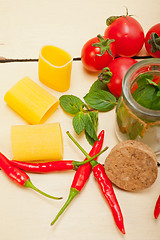 Image showing Italian pasta paccheri with tomato mint and chili pepper