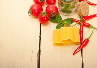 Image showing Italian pasta paccheri with tomato mint and chili pepper