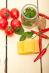 Image showing Italian pasta paccheri with tomato mint and chili pepper