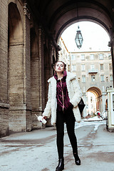 Image showing young pretty stylish teenage girl outside on city street fancy f