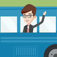 Image showing Man waving hand from bus window.