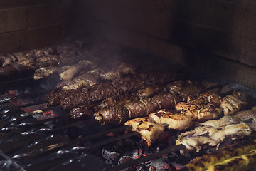 Image showing Grilling marinated shashlik