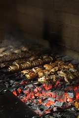 Image showing Grilling marinated shashlik