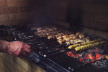 Image showing Grilling marinated shashlik