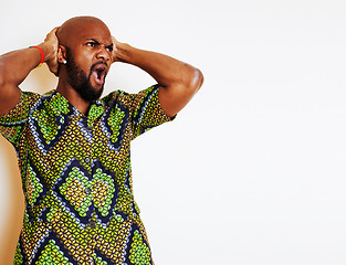 Image showing portrait of young handsome african man wearing bright green nati