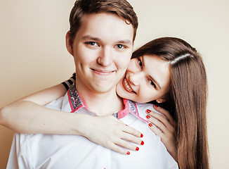 Image showing young pretty teenage couple, hipster guy with his girlfriend hap