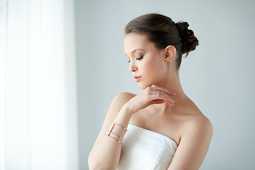 Image showing beautiful asian woman with ring and bracelet