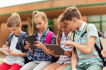 Image showing group of happy elementary school students talking