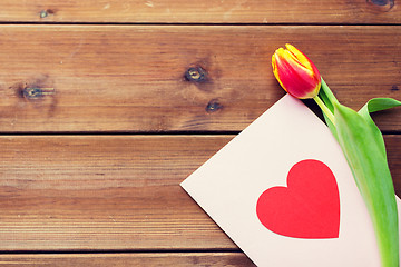 Image showing close up of flowers and greeting card with heart