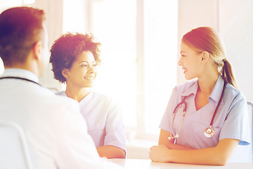 Image showing group of happy doctors meeting at hospital office