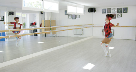 Image showing Dancing student performs in bright studio