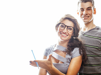 Image showing young pretty teenage couple, hipster guy with his girlfriend hap