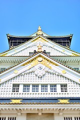 Image showing Osaka castle tower closeup with blue sky