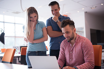 Image showing Group of young people employee workers with computer