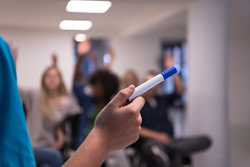 Image showing close up of teacher hand with marker